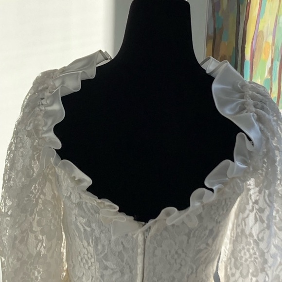 Elegant Satin & Lace Wedding Dress with Deep Ruffled Neckline and Long Train - Picture 2 of 12